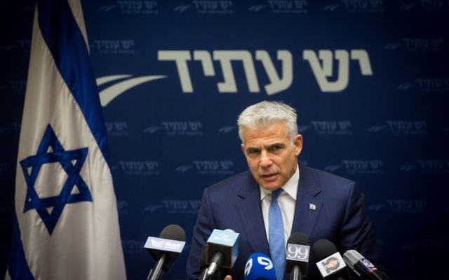 Yesh Atid party leader Yair Lapid leads a faction meeting in the Knesset on May 8, 2017. (Miriam Alster/FLASH90) 