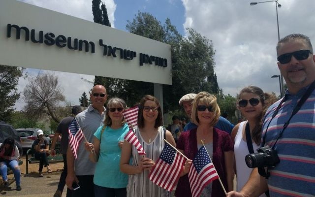 Trump supporters from Missouri and Texas, including Susan Anderson, second from left, and Misty Frost, third from right, outside the Israel Museum waiting for a glimpse of the Trump motorcade on May 22, 2017. (Melanie Lidman/Times of Israel)