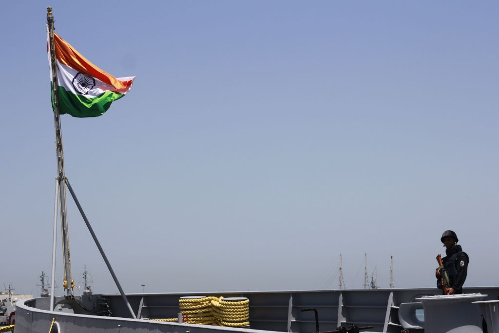 An Indian sailor stands guard aboard the INS Trishul, docked in the Haifa port for a visit, on May 10, 2017. (Judah Ari Gross/Times of Israel)