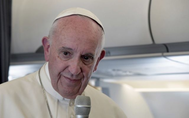 Pope Francis addresses journalists during the traditional press conference on his flight back to Rome, following a two-day visit at Fatima, Portugal, May 13, 2017. (Tiziana Fabi/Pool via AP)