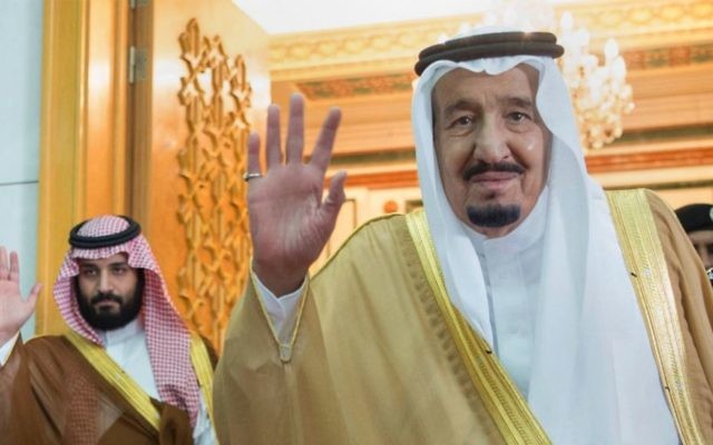 File: In this April 5, 2017 photo, released by the Saudi Press Agency, SPA, Saudi King Salman, right, and then-defense minister and deputy crown prince Mohammed bin Salman wave as they leave the hall after talks with the British prime minister, in Riyadh, Saudi Arabia. (Saudi Press Agency via AP)