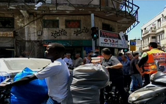 Medics at the scene of a suspected car-ramming attack in Tel Aviv on Monday, May 22, 2017 (screen capture: Channel 2)