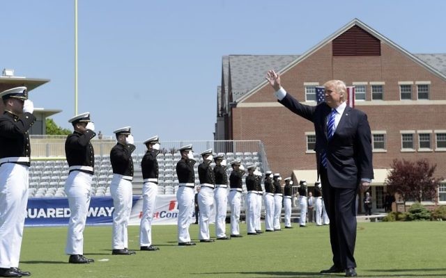 President Donald Trump waves as he arrives to give the commencement address at the US Coast Guard Academy, Wednesday, May 17, 2017, in New London, Conn. (AP Photo/Susan Walsh)