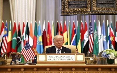 US President Donald Trump waits to deliver a speech to the Arab Islamic American Summit, at the King Abdulaziz Conference Center, in Riyadh, Saudi Arabia, May 21, 2017. (AP/Evan Vucci) 