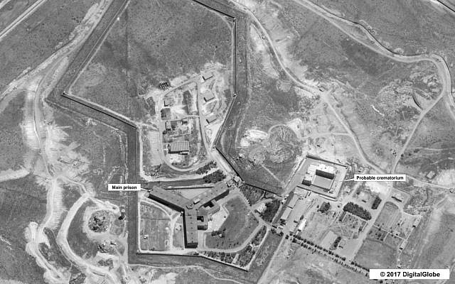 A satellite image of what the State Department described as a building in a prison complex in Syria that was modified to support a crematorium, April 18, 2017. (State Department/DigitalGlobe via AP)