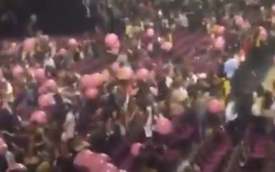 A screenshot from a video showing people fleeing the Manchester Arena in England afterf two reported explosions were heard at the scene during an Ariana Grande performance.
