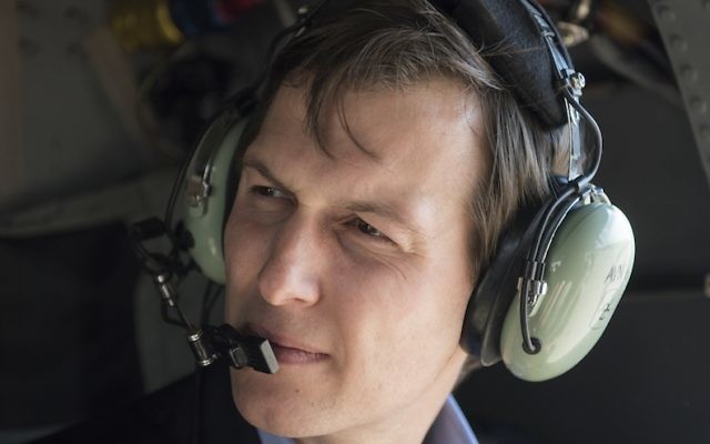 In this handout provided by the US Department of Defense, Jared Kushner, Senior Advisor to President Donald Trump, rides with military officials aboard a CH-47 helicopter over Baghdad, Iraq, April 3, 2017. (Dominique A. Pineiro/DoD via Getty Images via JTA)