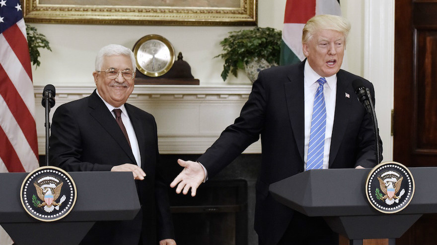 US President Donald Trump (right) giving a joint statement with Palestinian Authority President Mahmoud Abbas in the Roosevelt Room of the White House, May 3, 2017. (Olivier Douliery-Pool/Getty Images via JTA)