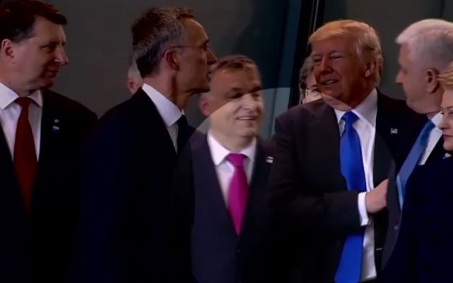 US President Donald Trump appears tp shove aside the prime minister of Montenegro in Brussels during a NATO conference, May 25, 2017. (Screenshot)