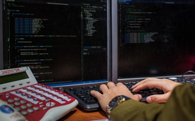 Illustrative. An IDF soldier from the C4I Corps types on a computer. (Israel Defense Forces)