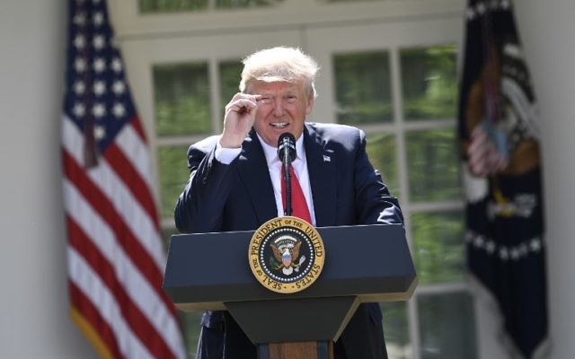 US President Donald Trump announces his decision to withdraw the US from the Paris Climate Accords in the Rose Garden of the White House in Washington, DC, on June 1, 2017. (AFP PHOTO / SAUL LOEB)