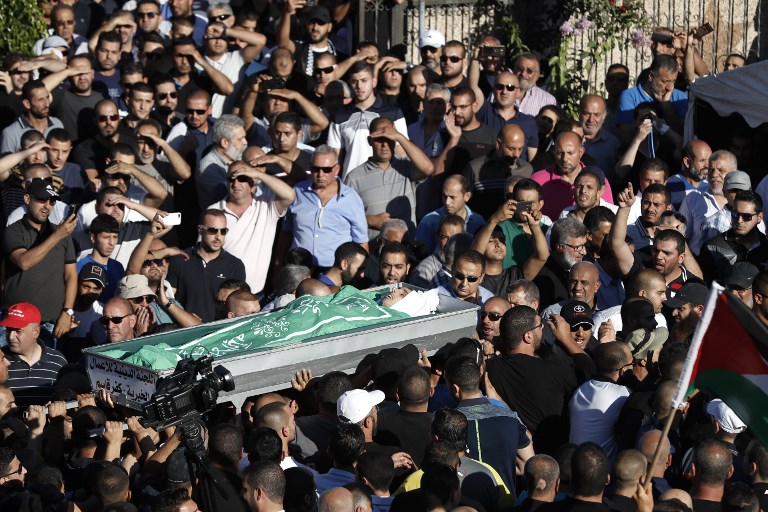 Thousands attend funeral of Arab Israeli man shot during riot | The ...