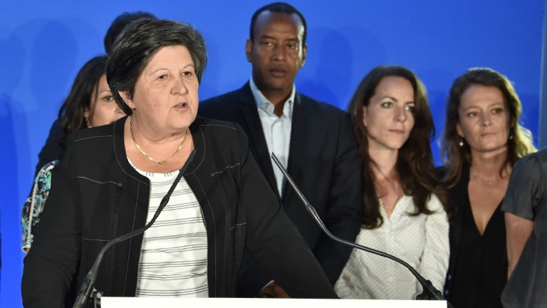 La Republique en Marche (REM) acting chairperson Catherine Barbaroux (L) gives a speech after polls closed for the first round of the French legislative elections in Paris, on June 11, 2017. (ALAIN JOCARD / AFP)