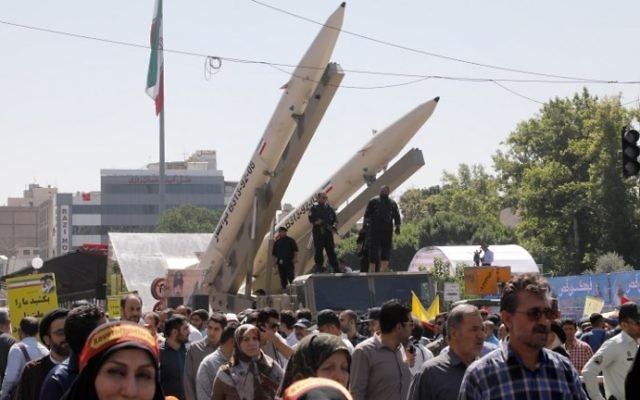 Zolfaghar missiles, right, are displayed during a rally marking al-Quds (Jerusalem) Day in Tehran on June 23, 2017. (AFP/Stringer)