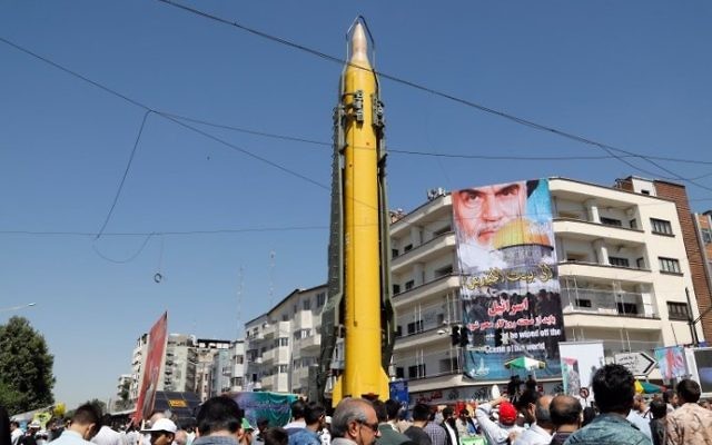 A Shahab-3 long range missile is displayed during a rally marking Jerusalem Day in Tehran, on June 23, 2017.  (AFP PHOTO / Stringer)