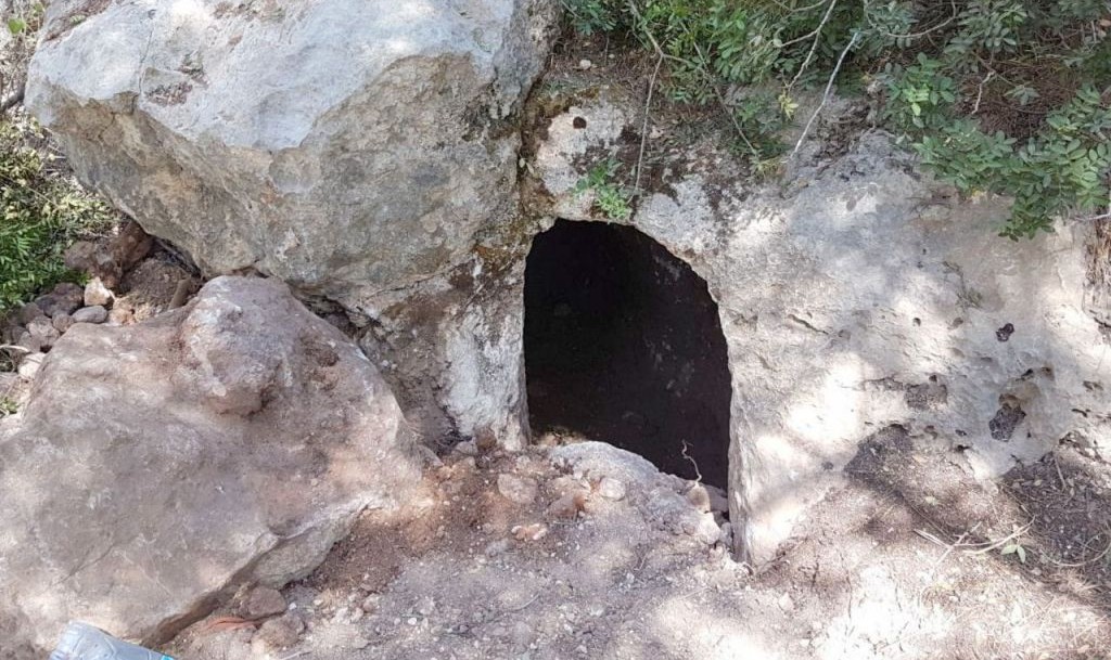 Opening to the underground system used for antiquities robbery close to the northern Israel archaeological site of Tsippori. (Israel Antiquities Authority)