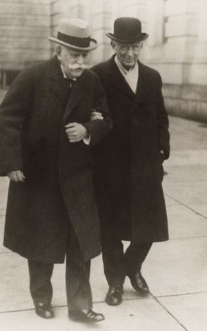  Justices Oliver Wendell Holmes, Jr., left, and Louis Brandeis walking arm in arm, circa 1928. (L.C. Handy Studios/ Historical & Special Collections, Harvard Law School Library)
