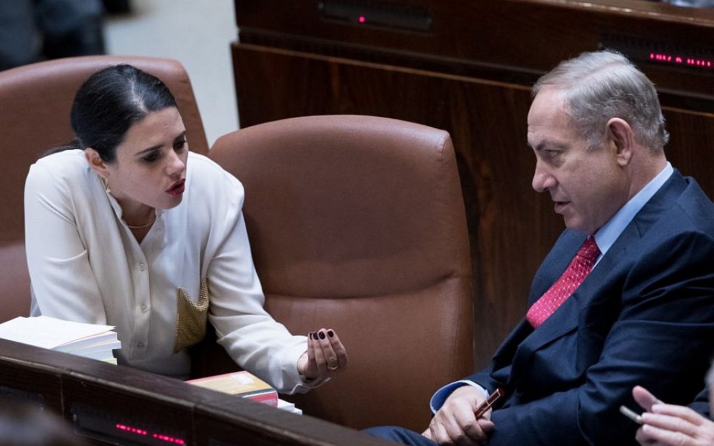 Prime Minister Benjamin Netanyahu, right, speaks with Justice Minister Ayelet Shaked in the Knesset, December 21, 2016. (Yonatan Sindel/Flash90)