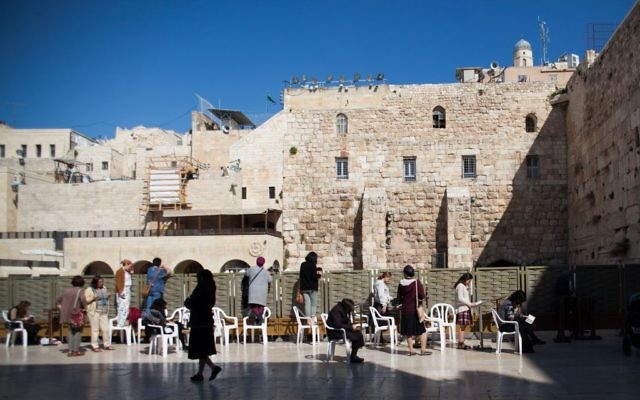 Jewish women pray at the Western Wall, Judaism's holiest prayer site in the Old City of Jerusalem, March 7, 2017. (Nora Savosnick/Flash90)