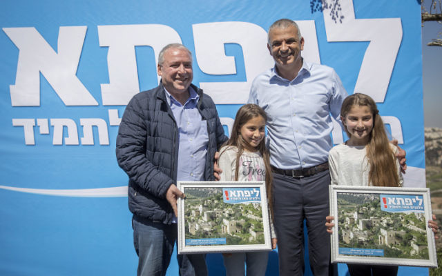 Finance Minister Moshe Kahlon and MK David Amsallem attend a ceremony to mark the agreement signed between the state and the residents of Lifta, in Lifta, Jerusalem. March 8, 2017. Photo by Yonatan Sindel/Flash90