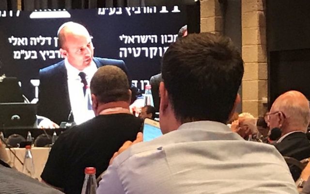 Naftali Bennett speaking at a business conference in Jerusalem, June 19 2017. (Shoshanna Solomon/Times of Israel)