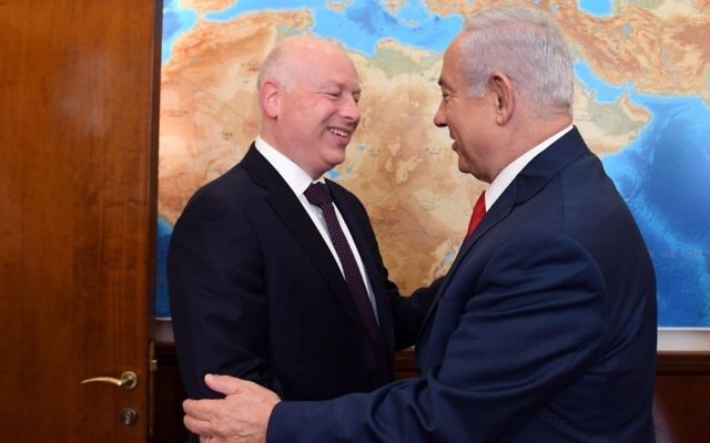 US President Donald Trump's envoy to the Middle East Jason Greenblatt, left, and Prime Minister Benjamin Netanyahu exchange greetings at the Prime Minister's Office in Jerusalem, July 12, 2017. (Haim Tzach/GPO)