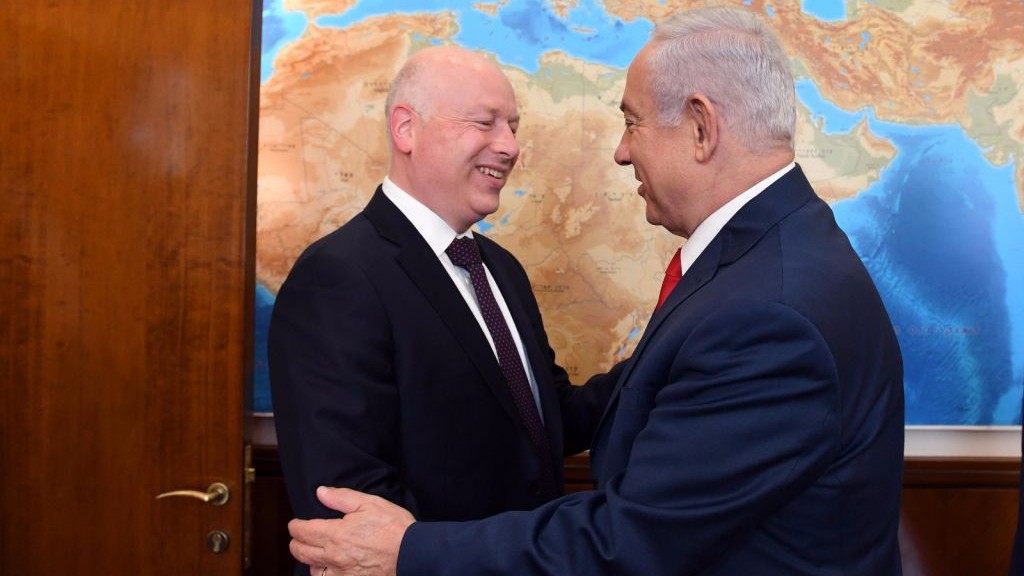 US President Donald Trump's envoy to the Middle East Jason Greenblatt (L) and Prime Minister Benjamin Netanyahu exchange greetings at the Prime Minister's Office in Jerusalem on July 12, 2017. (Haim Tzach/GPO)