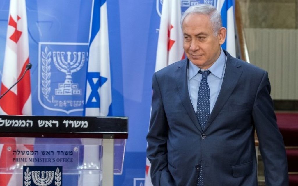 Prime Minister Benjamin Netanyahu arrives for a press conference with his Georgian counterpart Giorgi Kvirikashvili at his office in Jerusalem on July 24, 2017. (AFP PHOTO / POOL / JACK GUEZ)