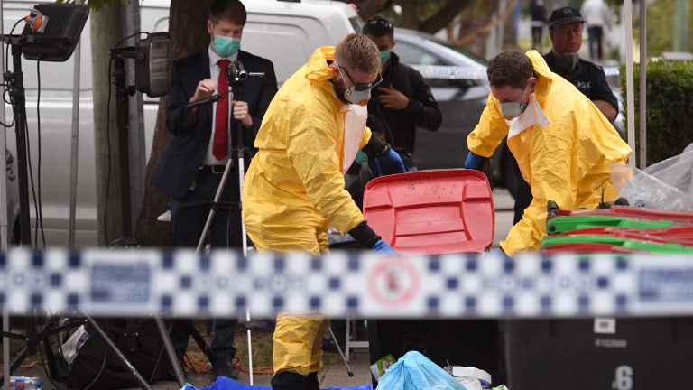 Police search for evidence at a block of flats in the Sydney suburb of Lakemba on July 31, 2017, after counter-terrorism raids across the city on the weekend. (AFP PHOTO / WILLIAM WEST)