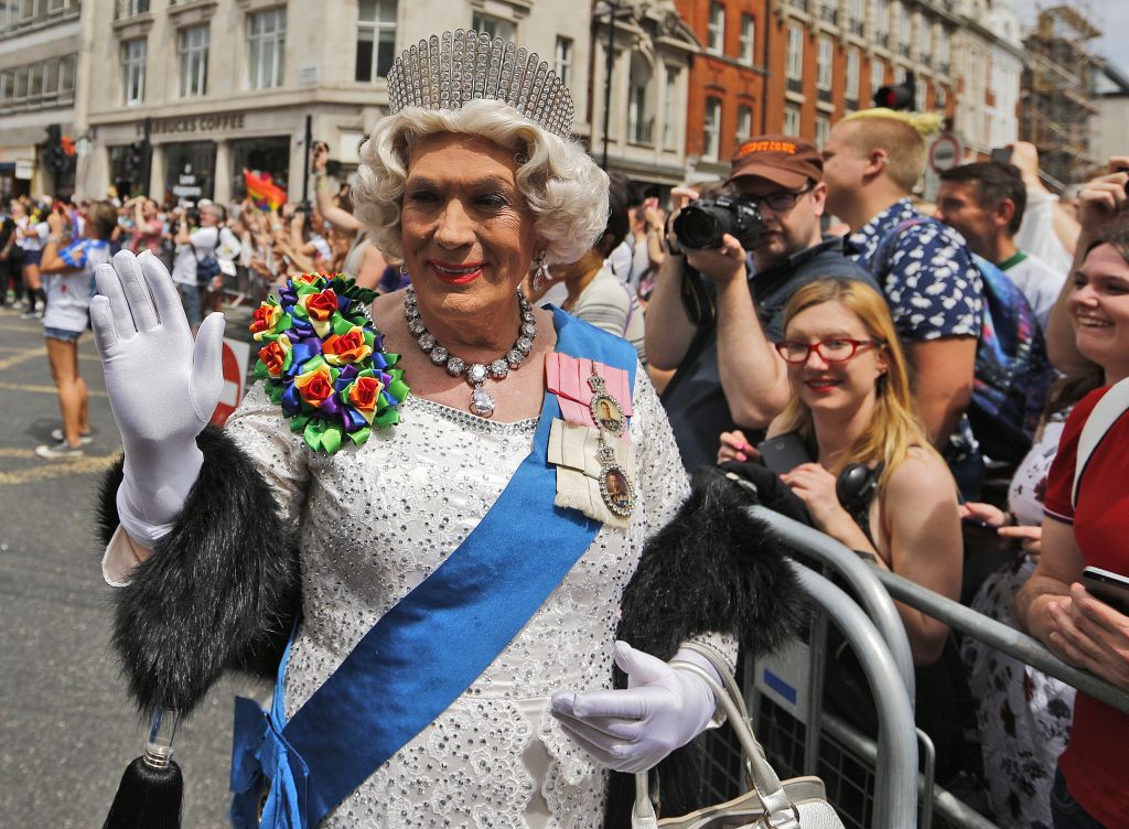 A reveler dressed as the Queen enjoys the Pride London Parade in London, Saturday, July 8, 2017. (AP Photo/Frank Augstein)