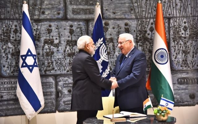 Indian Prime Minister Narendra Modi and President Reuven Rivlin shake hands during a meeting in Rivlin's Jerusalem residence on Wednesday, July 5, 2017 (courtesy)