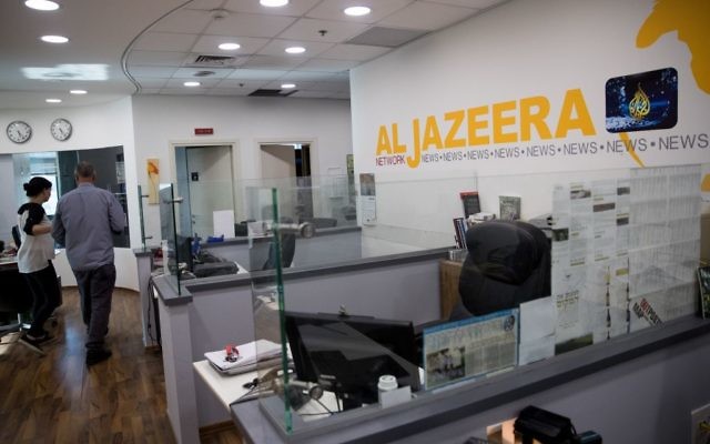 Workers at the al-Jazeera offices in Jerusalem on June 13, 2017. (Yonatan Sindel/Flash90)
