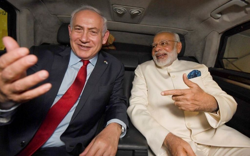 Prime Minister Benjamin Netanyahu sits in a car with his Indian counterpart Narendra Modi after the latter arrived at Ben Gurion International Airport in Tel Aviv on July 4, 2017. (Haim Zach/GPO/Flash90)