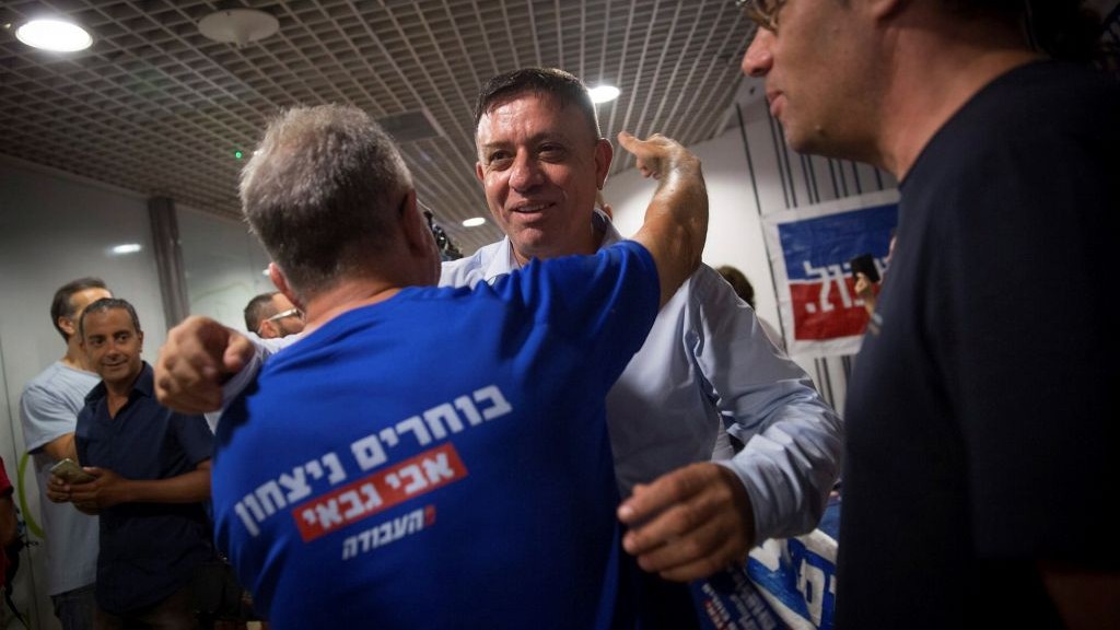 Avi Gabbay arrives to a polling station in Tel Aviv on July 10, 2017. (Miriam Alster/Flash90)