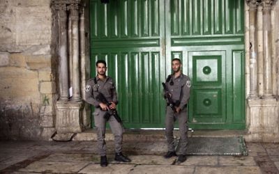 Border Police officers stand guard at an entrance to the Temple Mount compound in Jerusalem's Old City, Friday, July 14, 2017. (AP/Mahmoud Illean)
