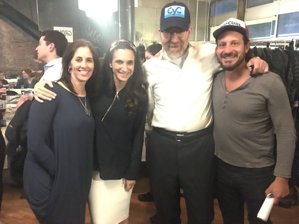 Rabbi Shmuel Lynn, second from right, posing with Meor Manhattan staff. (Josefin Dolsten/JTA)