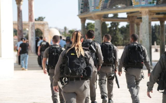 Border Police officers walk on the Temple Mount after a shooting attack in the area left three people injured, two of them seriously, on July 14, 2017. (Israel Police)