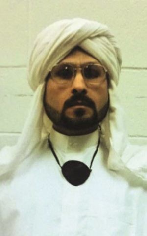 Abu Zubaydah in 2017 with eye patch around his neck. (Courtesy)