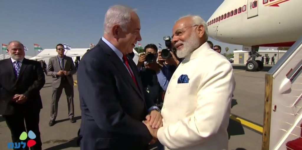 Prime Minister Benjamin Netanyahu, left, and Indian Premier Narendra Modi at Ben Gurion Airport on July 4, 2017. (screen capture: GPO)