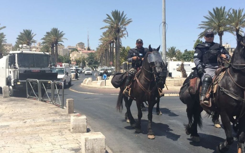 Police outside Damascus Gate near Jerusalem's Old City on July 28, 2017. (Judah Ari Gross/Times of Israel)
