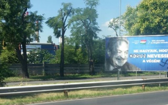 An anti-Soros billboard with a swastika and Soros's name replaced by Viktor Orban's seen in Budapest on July 17, 2017. (Raphael Ahren/Times of Israel)