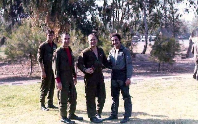 Roy “Bubba” Segars, second from right, and Jacob “Booby” Daube, far right, posing during the 1973 Yom Kippur War at the Tel Nof airbase in Israel, June 28, 2017. (IDF Spokesperson, courtesy) 