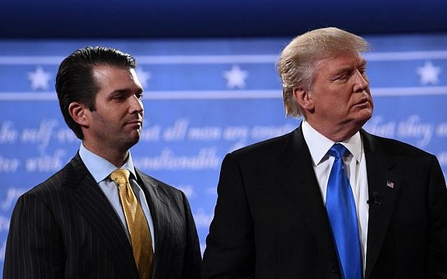 Then-Republican nominee Donald Trump (R) standing with his son Donald Trump Jr. after the first presidential debate at Hofstra University in Hempstead, New York, September 26, 2016 (AFP Photo/Jewel SAMAD)