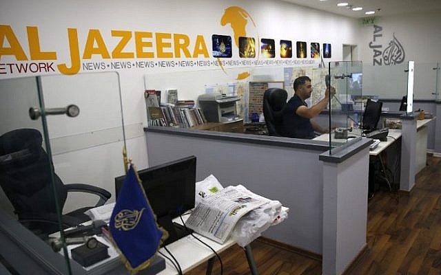 Illustrative: The Jerusalem office of Qatar-based news network and TV channel Al Jazeera on July 31, 2017 (AFP Photo/Ahmad Gharabli)