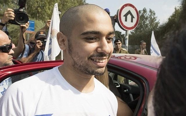 Former soldier Elor Azaria, who was convicted of manslaughter and sentenced to 18 months, later commuted to 14 months, for killing an incapacitated Palestinian assailant, arrives at the Tsrifin military prison in Rishon Lezion, on August 9, 2017, to begin serving out his sentence. (AFP/Jack Guez)