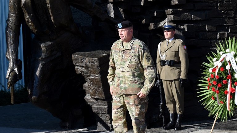Lieutenant General Ben Hodges, the US Army commander in Europe, stands after laying a wreath at Warsaw Uprising Monument on August 14, 2017, in the Polish capital Warsaw on the eve of Armed Forces Day in NATO member Poland. (AFP Photo/Janek Skarzynski)