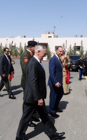 US Defense Secretary Jim Mattis, center left, walks with Jordan's Prince Faisal, center right, the brother of King Abdullah II, as he is welcomed and escorted to his meeting with the King in Amman on August 21, 2017. (AFP / Paul HANDLEY)