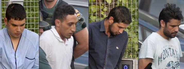 This combination of pictures created on August 22, 2017 shows (from L) Mohamed Houli Chemlal, Driss Oukabir, Salah El Karib, and Mohamed Aallaa, suspected of involvement in the terror cell that carried out twin attacks in Barcelona and Cambrils, at a detention center in Tres Cantos, near Madrid, on August 22, 2017, before being transferred to the National Court. (AFP Photo/Stringer)