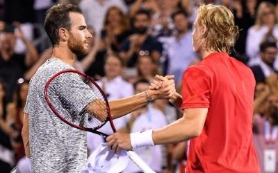  Adrian Mannarino of France congratulates Denis Shapovalov of Canada on his 2-6, 6-3, 6-4 victory during day eight of the Rogers Cup presented by National Bank at Uniprix Stadium on August 11, 2017 in Montreal, Quebec, Canada. (Minas Panagiotakis/Getty Images/AFP)