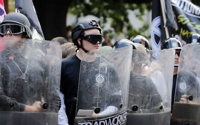 Members of a state militia looking like riot police at the "Unite the Right" rally August 12, 2017 in Charlottesville, Virginia. Chip Somodevilla/Getty Images/AFP)